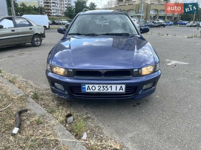 Синий Мицубиси Галант, объемом двигателя 2 л и пробегом 317 тыс. км за 2994 $, фото 1 на Automoto.ua
