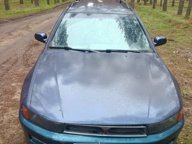 Синий Мицубиси Галант, объемом двигателя 2 л и пробегом 400 тыс. км за 1600 $, фото 1 на Automoto.ua