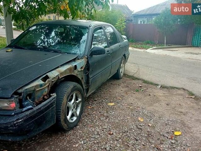 Синий Мицубиси Галант, объемом двигателя 1.8 л и пробегом 400 тыс. км за 1200 $, фото 1 на Automoto.ua