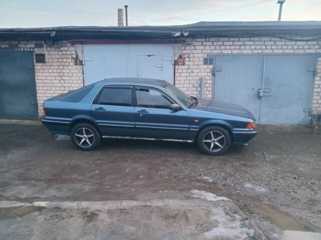 Синій Міцубісі Галант, об'ємом двигуна 2 л та пробігом 350 тис. км за 1000 $, фото 1 на Automoto.ua