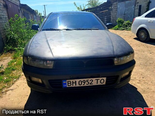 Зеленый Мицубиси Галант, объемом двигателя 2 л и пробегом 365 тыс. км за 3599 $, фото 1 на Automoto.ua