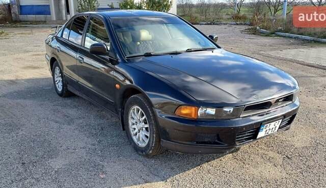 Зеленый Мицубиси Галант, объемом двигателя 2.5 л и пробегом 300 тыс. км за 3100 $, фото 1 на Automoto.ua