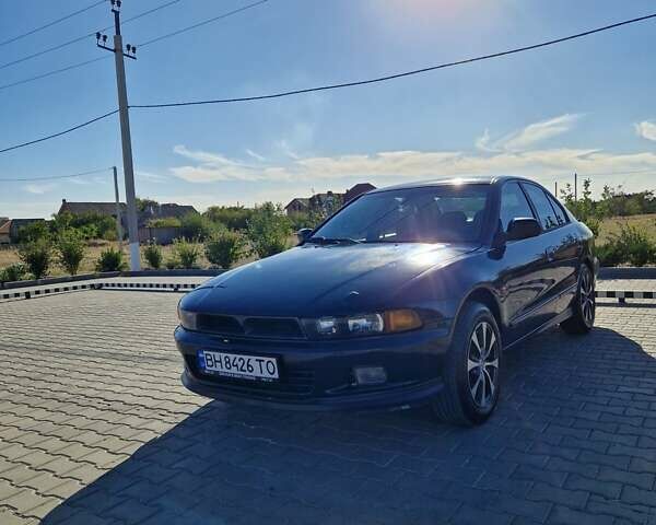 Зеленый Мицубиси Галант, объемом двигателя 2 л и пробегом 384 тыс. км за 3000 $, фото 1 на Automoto.ua