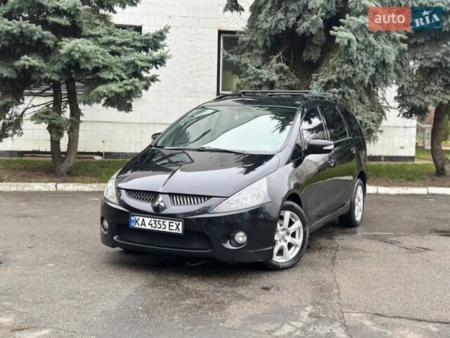 Черный Мицубиси Грандис, объемом двигателя 2.4 л и пробегом 290 тыс. км за 4650 $, фото 1 на Automoto.ua