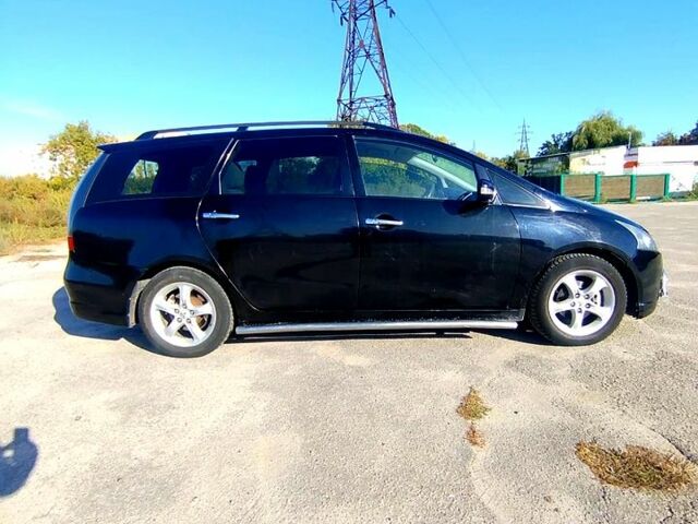 Черный Мицубиси Грандис, объемом двигателя 2.4 л и пробегом 209 тыс. км за 3700 $, фото 1 на Automoto.ua