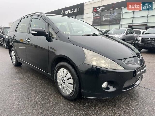 Черный Мицубиси Грандис, объемом двигателя 2.4 л и пробегом 212 тыс. км за 5300 $, фото 1 на Automoto.ua