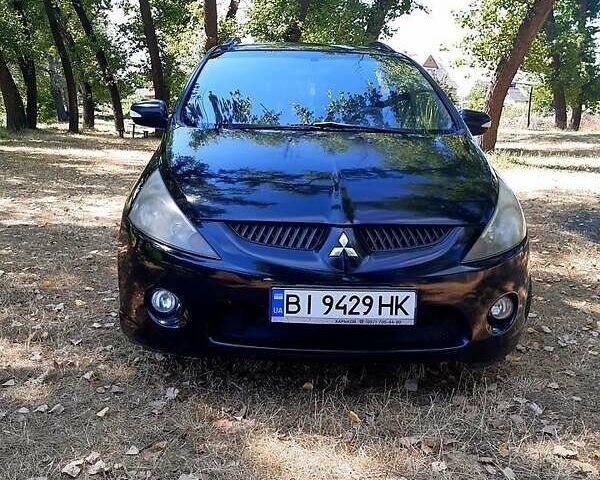 Черный Мицубиси Грандис, объемом двигателя 2.4 л и пробегом 326 тыс. км за 5500 $, фото 1 на Automoto.ua