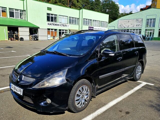 Черный Мицубиси Грандис, объемом двигателя 2.4 л и пробегом 242 тыс. км за 3900 $, фото 1 на Automoto.ua