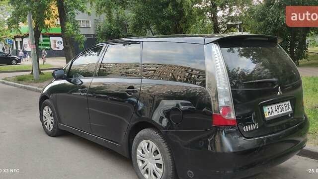 Черный Мицубиси Грандис, объемом двигателя 2.4 л и пробегом 380 тыс. км за 4400 $, фото 1 на Automoto.ua