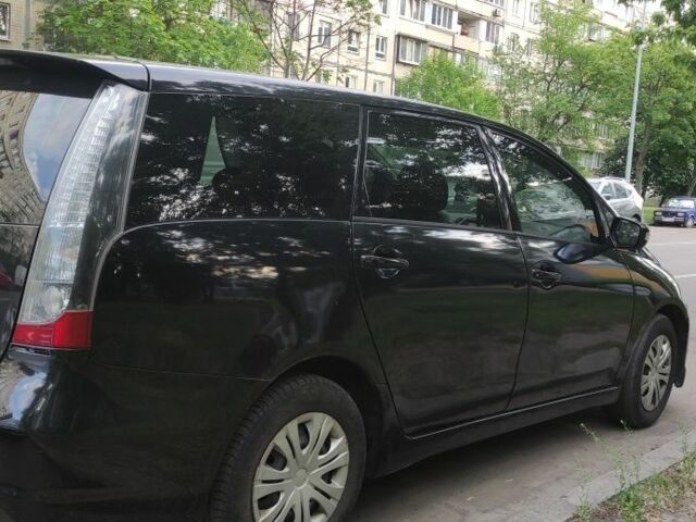 Черный Мицубиси Грандис, объемом двигателя 2.4 л и пробегом 380 тыс. км за 4400 $, фото 1 на Automoto.ua