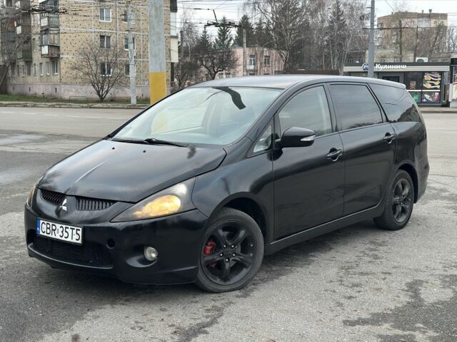 Черный Мицубиси Грандис, объемом двигателя 0 л и пробегом 321 тыс. км за 2400 $, фото 1 на Automoto.ua