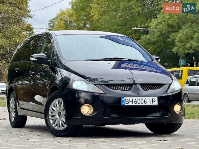 Черный Мицубиси Грандис, объемом двигателя 2.4 л и пробегом 323 тыс. км за 5999 $, фото 1 на Automoto.ua