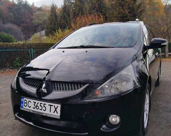 Черный Мицубиси Грандис, объемом двигателя 2.38 л и пробегом 215 тыс. км за 5900 $, фото 1 на Automoto.ua