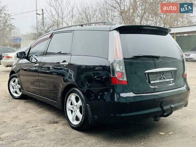 Черный Мицубиси Грандис, объемом двигателя 2.4 л и пробегом 188 тыс. км за 6800 $, фото 1 на Automoto.ua