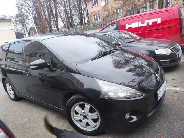 Черный Мицубиси Грандис, объемом двигателя 2.4 л и пробегом 320 тыс. км за 5700 $, фото 1 на Automoto.ua