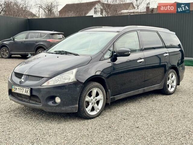 Черный Мицубиси Грандис, объемом двигателя 2.4 л и пробегом 185 тыс. км за 5899 $, фото 1 на Automoto.ua