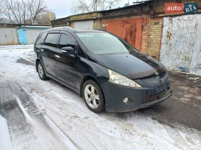 Черный Мицубиси Грандис, объемом двигателя 2.4 л и пробегом 230 тыс. км за 4300 $, фото 1 на Automoto.ua