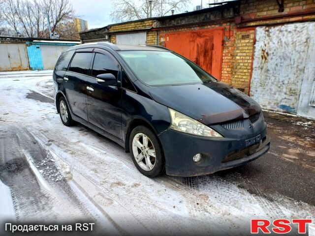 Черный Мицубиси Грандис, объемом двигателя 2.4 л и пробегом 223 тыс. км за 6500 $, фото 1 на Automoto.ua