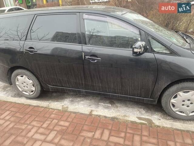 Черный Мицубиси Грандис, объемом двигателя 2.4 л и пробегом 115 тыс. км за 8350 $, фото 1 на Automoto.ua