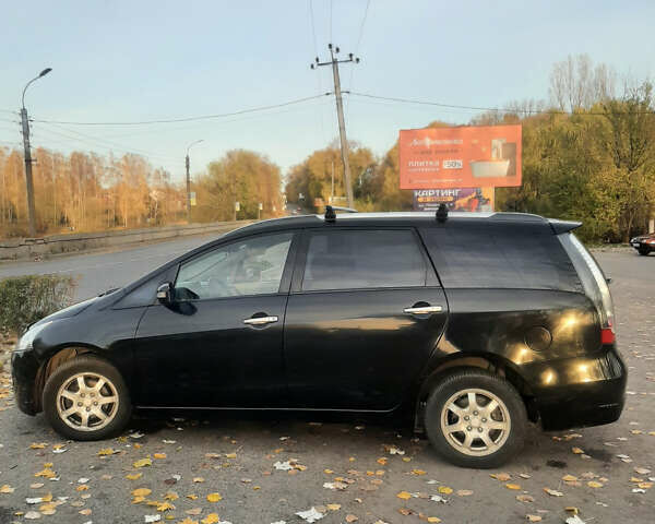 Чорний Міцубісі Грандіс, об'ємом двигуна 2.38 л та пробігом 240 тис. км за 7500 $, фото 1 на Automoto.ua