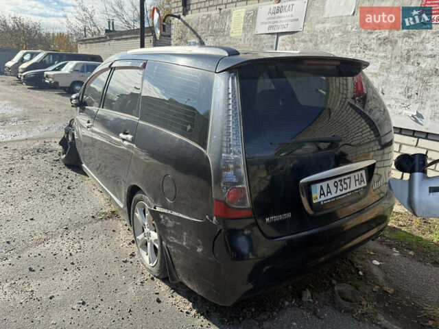 Черный Мицубиси Грандис, объемом двигателя 2.4 л и пробегом 220 тыс. км за 2999 $, фото 1 на Automoto.ua