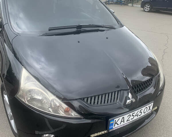 Чорний Міцубісі Грандіс, об'ємом двигуна 2.38 л та пробігом 190 тис. км за 6500 $, фото 1 на Automoto.ua