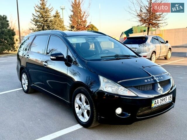 Черный Мицубиси Грандис, объемом двигателя 2.38 л и пробегом 405 тыс. км за 5450 $, фото 1 на Automoto.ua