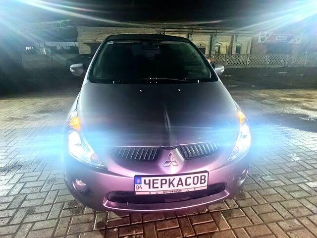 Фиолетовый Мицубиси Грандис, объемом двигателя 2.4 л и пробегом 273 тыс. км за 6000 $, фото 1 на Automoto.ua