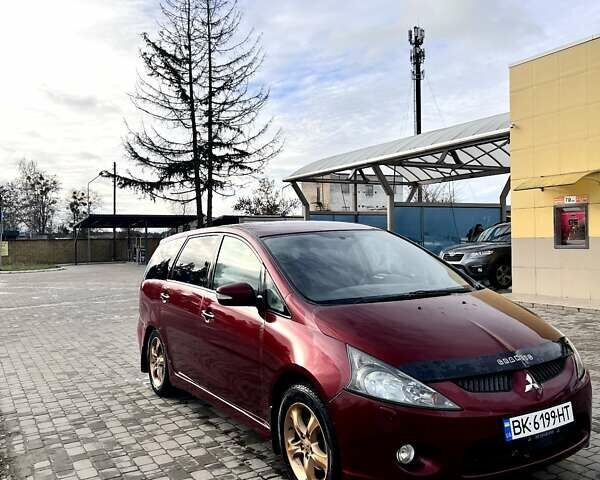 Червоний Міцубісі Грандіс, об'ємом двигуна 2.38 л та пробігом 341 тис. км за 3900 $, фото 1 на Automoto.ua