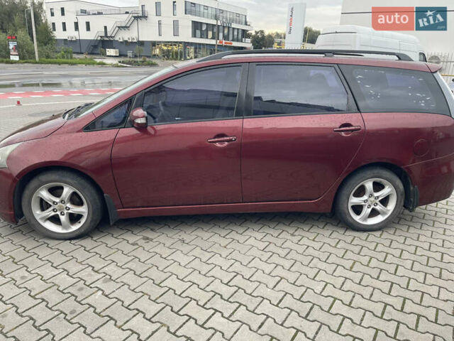 Красный Мицубиси Грандис, объемом двигателя 2.38 л и пробегом 117 тыс. км за 6999 $, фото 1 на Automoto.ua