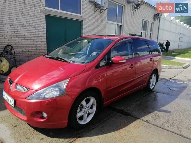 Красный Мицубиси Грандис, объемом двигателя 1.97 л и пробегом 235 тыс. км за 7100 $, фото 1 на Automoto.ua