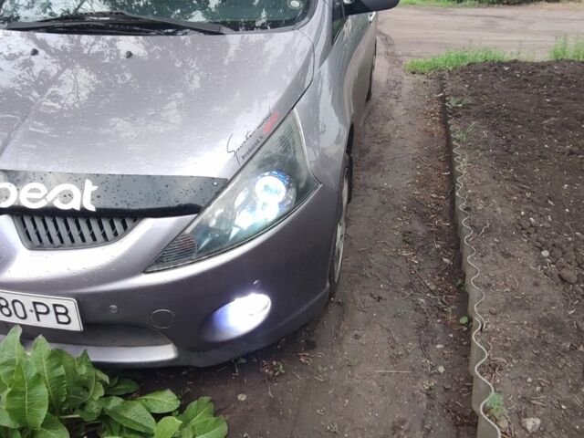 Серый Мицубиси Грандис, объемом двигателя 2.4 л и пробегом 219 тыс. км за 6950 $, фото 1 на Automoto.ua