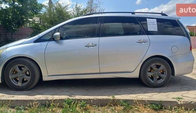 Серый Мицубиси Грандис, объемом двигателя 2.4 л и пробегом 312 тыс. км за 6800 $, фото 1 на Automoto.ua