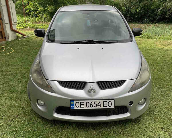 Серый Мицубиси Грандис, объемом двигателя 1.97 л и пробегом 394 тыс. км за 5600 $, фото 1 на Automoto.ua