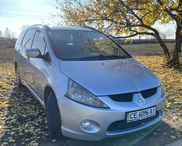 Серый Мицубиси Грандис, объемом двигателя 2.4 л и пробегом 293 тыс. км за 5200 $, фото 1 на Automoto.ua