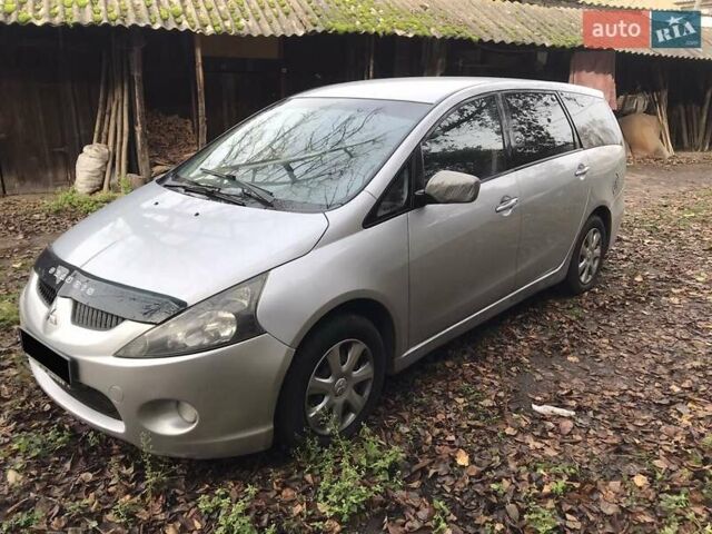 Серый Мицубиси Грандис, объемом двигателя 2.4 л и пробегом 250 тыс. км за 5999 $, фото 1 на Automoto.ua
