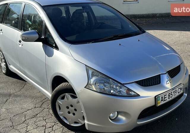 Серый Мицубиси Грандис, объемом двигателя 2.4 л и пробегом 150 тыс. км за 7200 $, фото 1 на Automoto.ua