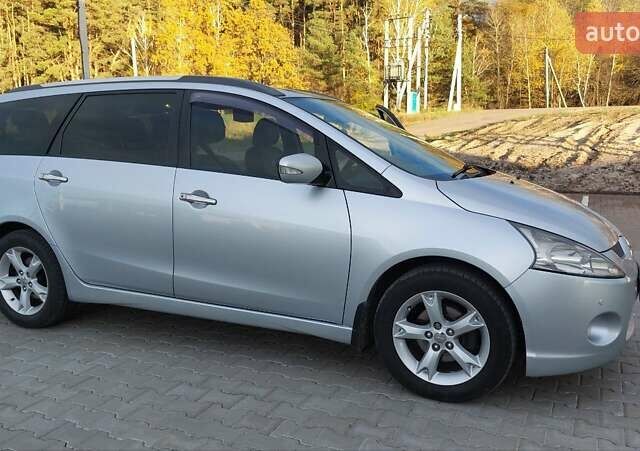 Сірий Міцубісі Грандіс, об'ємом двигуна 2.38 л та пробігом 296 тис. км за 7000 $, фото 1 на Automoto.ua
