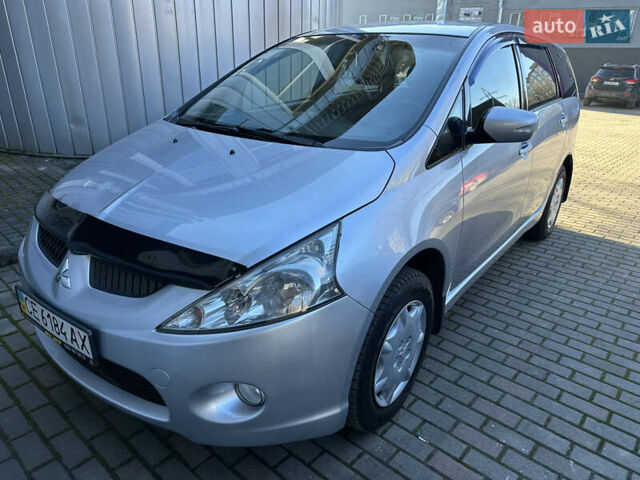 Серый Мицубиси Грандис, объемом двигателя 2.4 л и пробегом 276 тыс. км за 6800 $, фото 1 на Automoto.ua