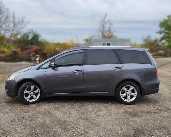 Серый Мицубиси Грандис, объемом двигателя 2.4 л и пробегом 180 тыс. км за 7500 $, фото 1 на Automoto.ua