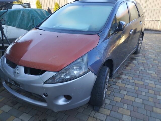 Синий Мицубиси Грандис, объемом двигателя 2.4 л и пробегом 247 тыс. км за 2350 $, фото 1 на Automoto.ua