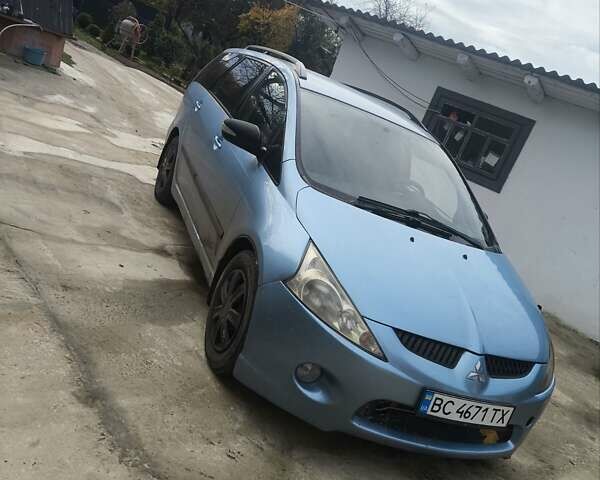 Синий Мицубиси Грандис, объемом двигателя 2.4 л и пробегом 350 тыс. км за 5450 $, фото 1 на Automoto.ua