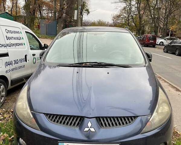 Синий Мицубиси Грандис, объемом двигателя 2.4 л и пробегом 266 тыс. км за 5200 $, фото 1 на Automoto.ua