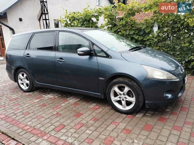 Синий Мицубиси Грандис, объемом двигателя 2 л и пробегом 250 тыс. км за 5500 $, фото 1 на Automoto.ua