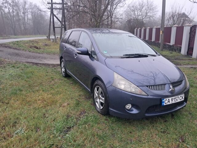 Синий Мицубиси Грандис, объемом двигателя 2 л и пробегом 291 тыс. км за 5400 $, фото 1 на Automoto.ua