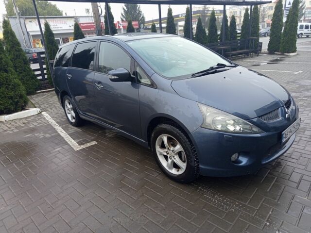 Синий Мицубиси Грандис, объемом двигателя 2 л и пробегом 320 тыс. км за 6550 $, фото 1 на Automoto.ua