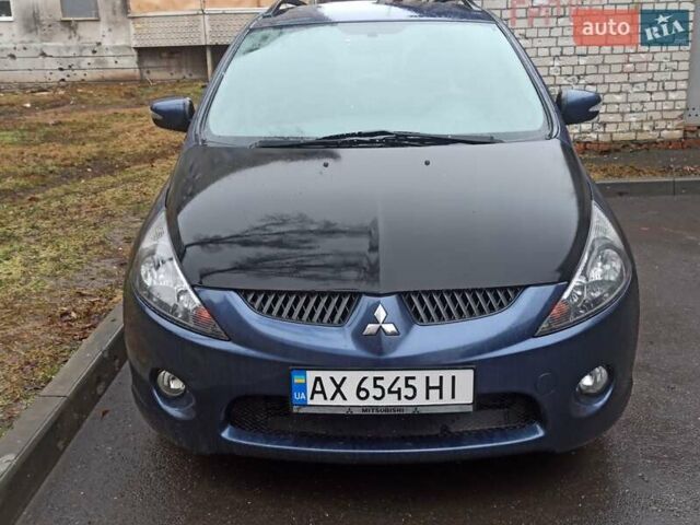 Синий Мицубиси Грандис, объемом двигателя 2.4 л и пробегом 173 тыс. км за 5500 $, фото 1 на Automoto.ua