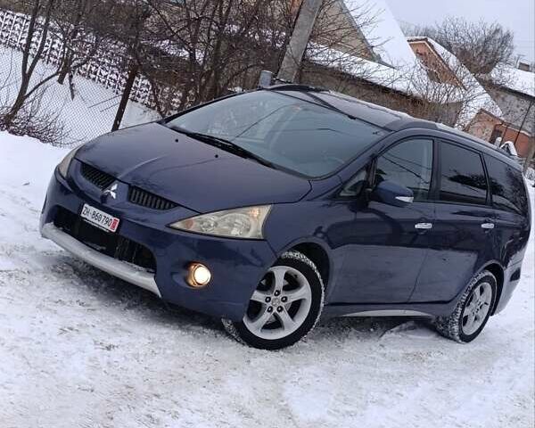 Синій Міцубісі Грандіс, об'ємом двигуна 2 л та пробігом 261 тис. км за 7400 $, фото 1 на Automoto.ua