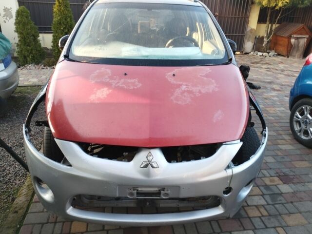 Синий Мицубиси Грандис, объемом двигателя 2.4 л и пробегом 280 тыс. км за 2700 $, фото 1 на Automoto.ua