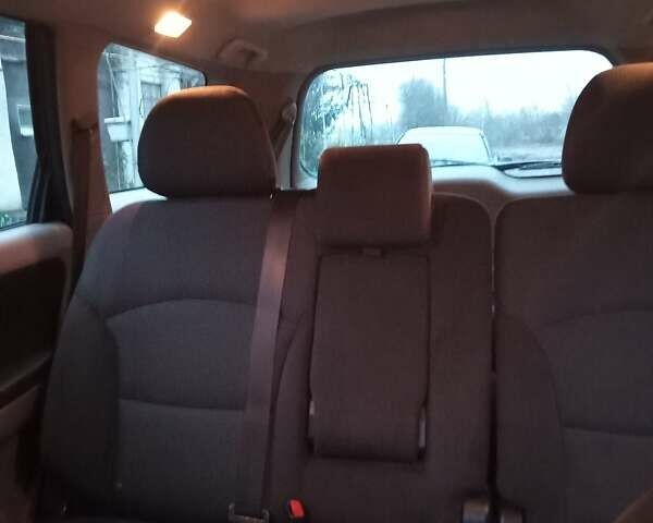 Синий Мицубиси Грандис, объемом двигателя 2.4 л и пробегом 300 тыс. км за 6000 $, фото 1 на Automoto.ua